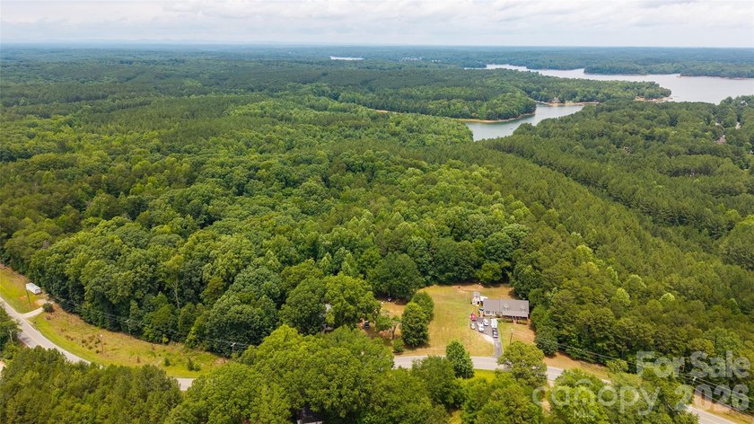 Being offered for sale is 11.68+/- acres of land with paved road - photo 3