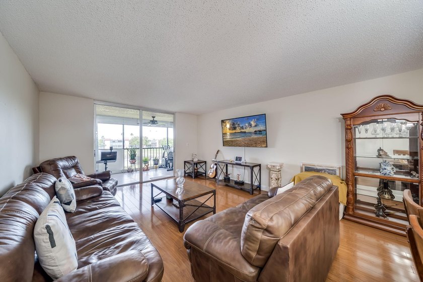 2/2 remodeled 55+ plus community. White Kitchen, New Tile, Wood - photo 13