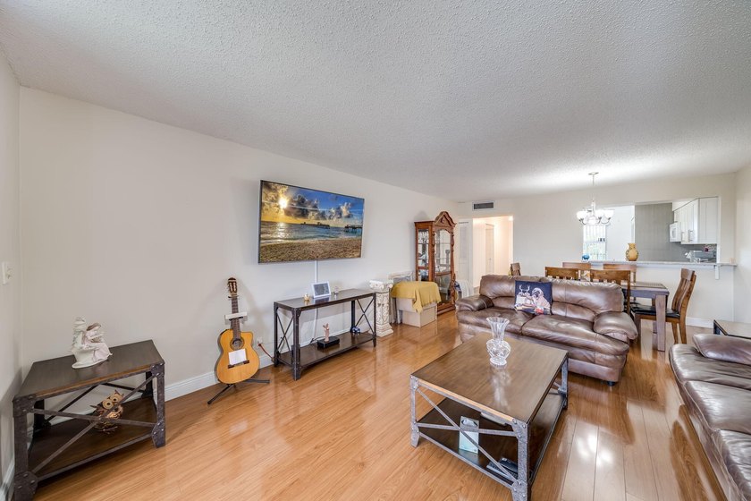 2/2 remodeled 55+ plus community. White Kitchen, New Tile, Wood - photo 16
