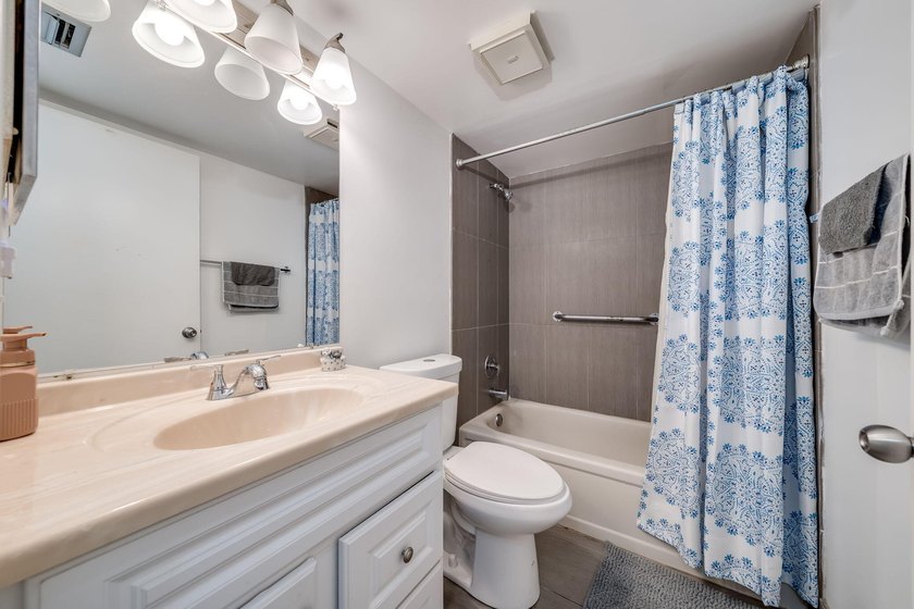2/2 remodeled 55+ plus community. White Kitchen, New Tile, Wood - photo 18
