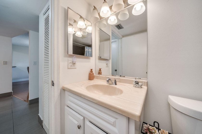 2/2 remodeled 55+ plus community. White Kitchen, New Tile, Wood - photo 19