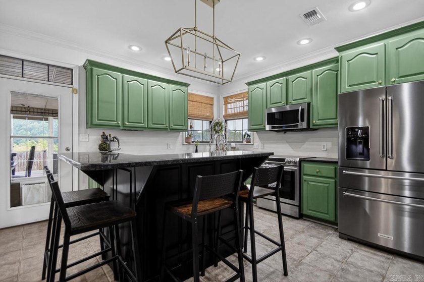 Welcome home to this beautifully designed 4-bedroom, 2.5-bath - photo 11