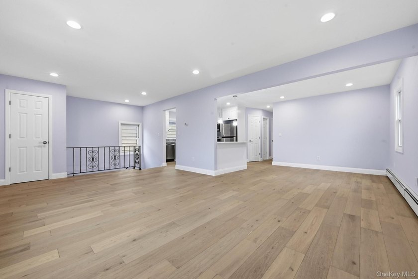Beutifully Renovated 2 Family High Ranch, 6 Bedrooms, 4 Full - photo 12