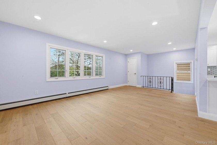 Beutifully Renovated 2 Family High Ranch, 6 Bedrooms, 4 Full - photo 13