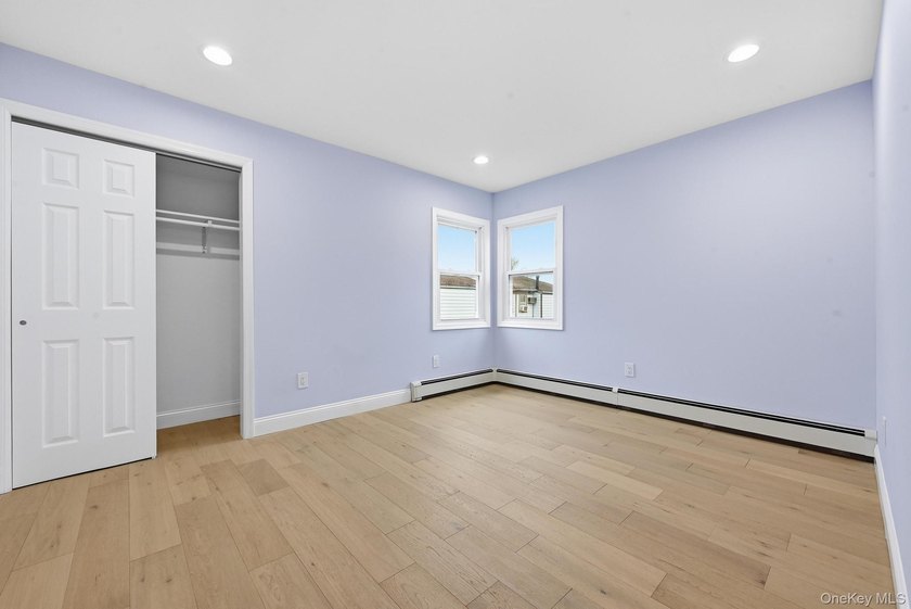 Beutifully Renovated 2 Family High Ranch, 6 Bedrooms, 4 Full - photo 19