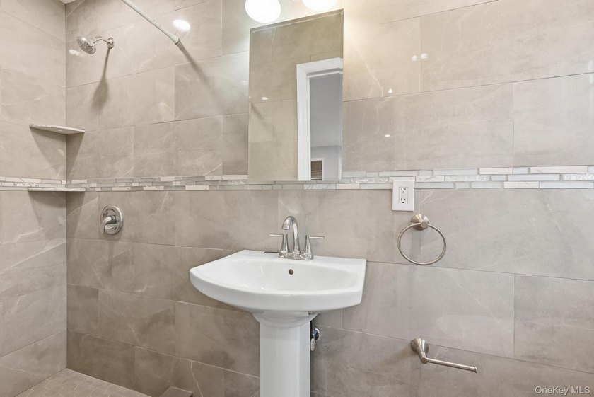 Beutifully Renovated 2 Family High Ranch, 6 Bedrooms, 4 Full - photo 23