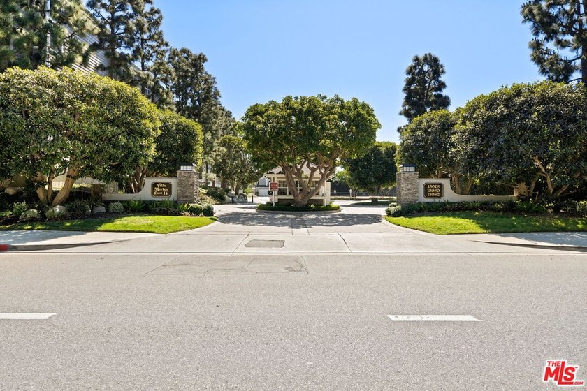 Nestled within the prestigious 24-hour guard-gated Villa Marina - photo 31