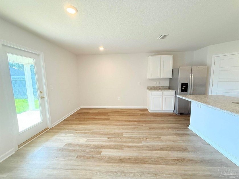 Welcome home to this like-new 4-bedroom, 2-bath residence - photo 5