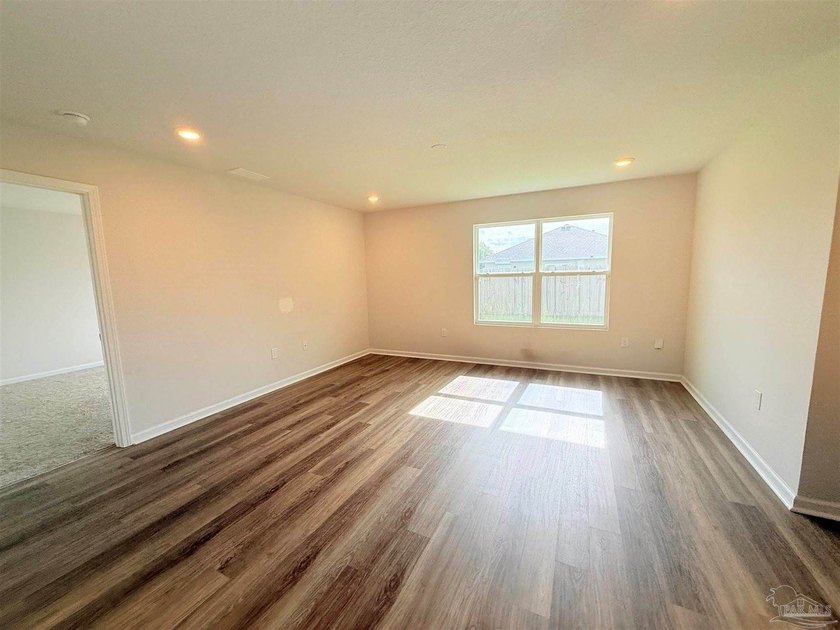 Welcome home to this like-new 4-bedroom, 2-bath residence - photo 6