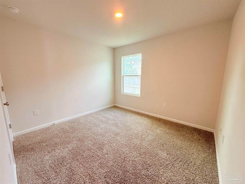 Welcome home to this like-new 4-bedroom, 2-bath residence - photo 9