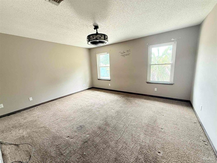 Spacious home offering a unique floor plan with plenty of room - photo 7