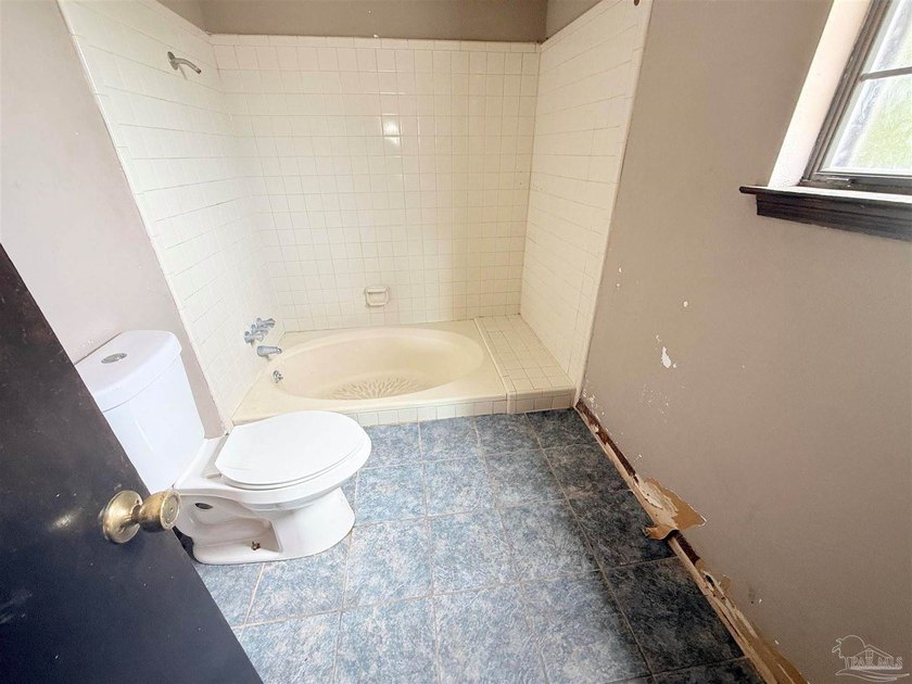 Spacious home offering a unique floor plan with plenty of room - photo 9