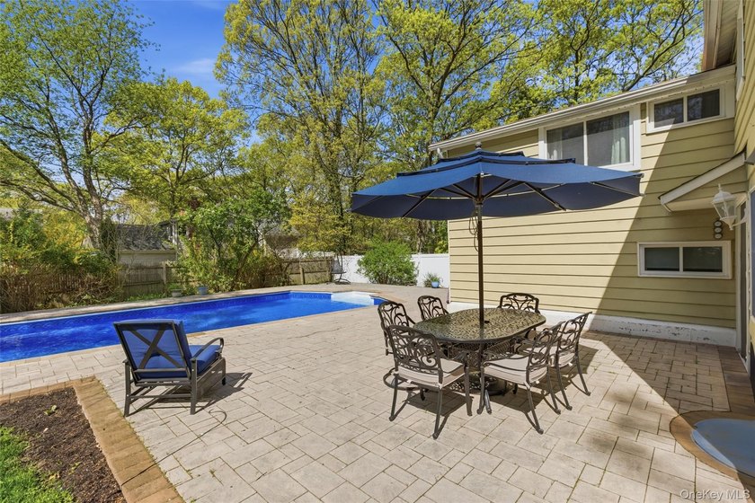 Welcome to 26 Woodchuck Lane in Setauket, located in the highly - photo 4