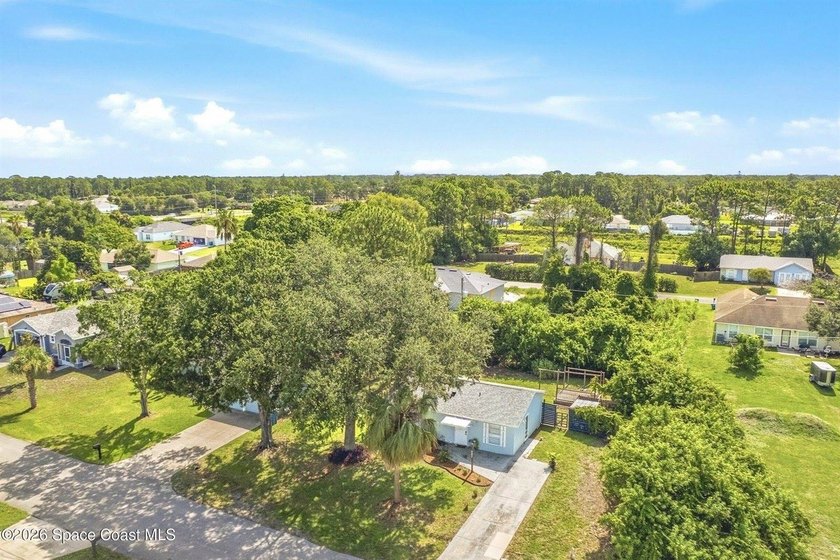 Welcome home to this cozy 2 bed 1 bath residence in Palm Bay - photo 2