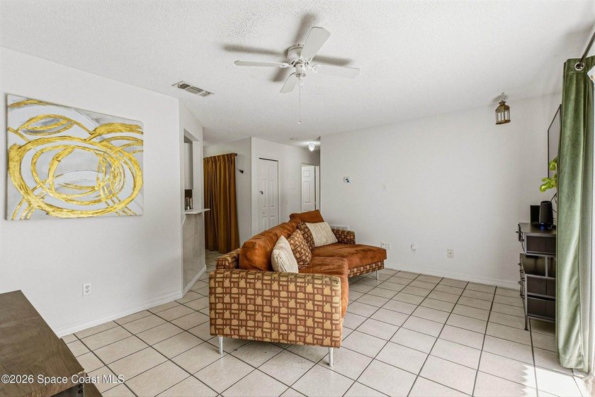 Welcome home to this cozy 2 bed 1 bath residence in Palm Bay - photo 5