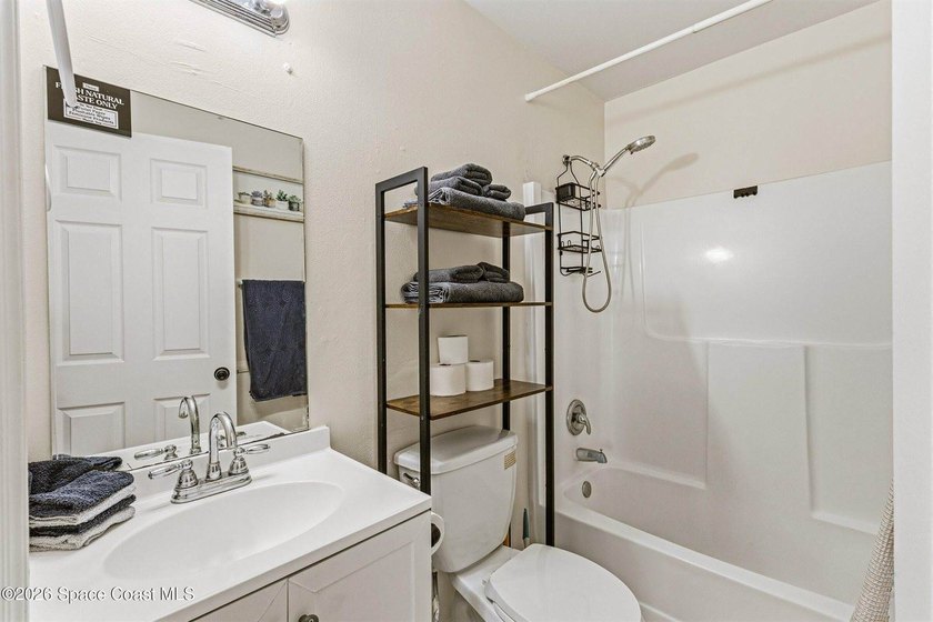 Welcome home to this cozy 2 bed 1 bath residence in Palm Bay - photo 7