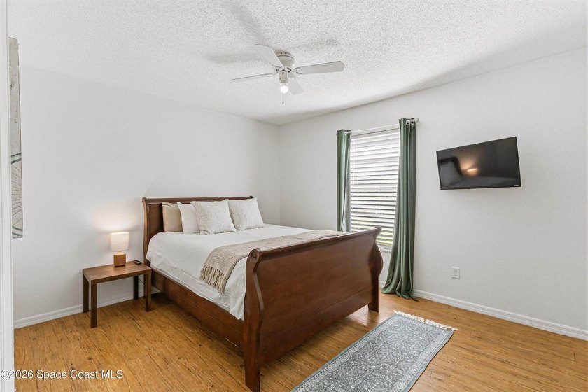 Welcome home to this cozy 2 bed 1 bath residence in Palm Bay - photo 8