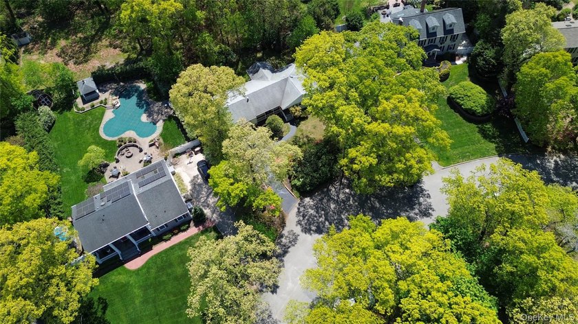 Nestled on a quiet cul-de-sac in one of East Setauket's most - photo 2