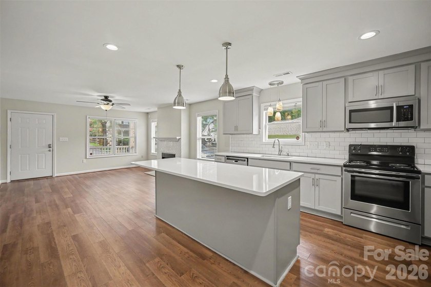 Beautifully renovated, walkable to downtown Belmont, in the - photo 7