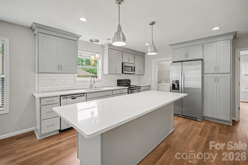 Beautifully renovated, walkable to downtown Belmont, in the - photo 8