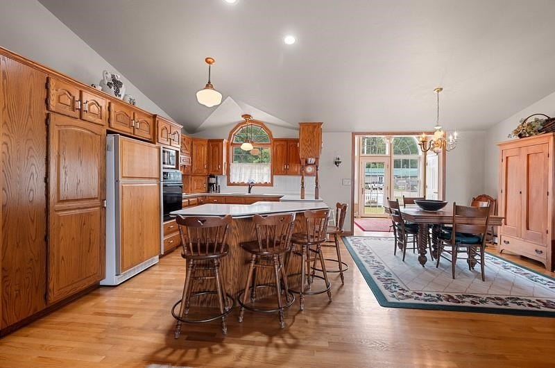Beautiful arched-window entry welcomes you to this inviting lake - photo 11