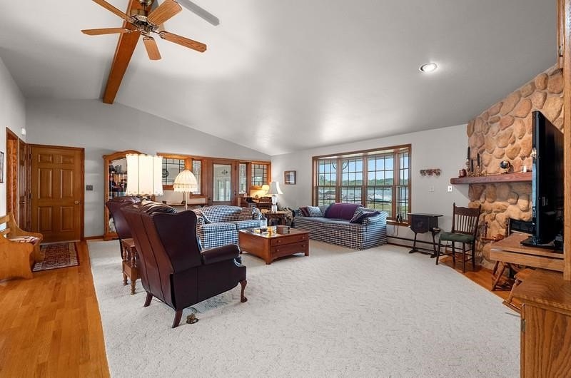 Beautiful arched-window entry welcomes you to this inviting lake - photo 19