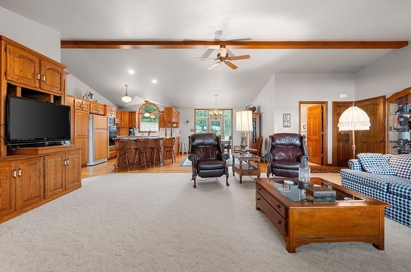 Beautiful arched-window entry welcomes you to this inviting lake - photo 21