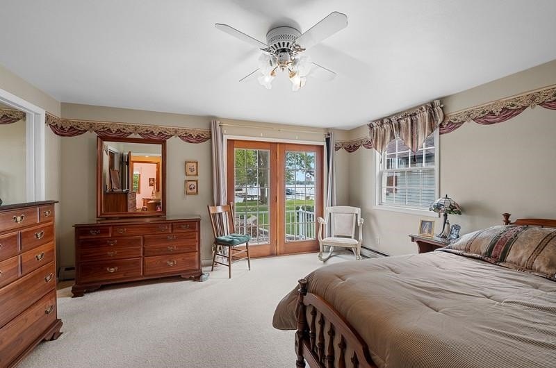 Beautiful arched-window entry welcomes you to this inviting lake - photo 32