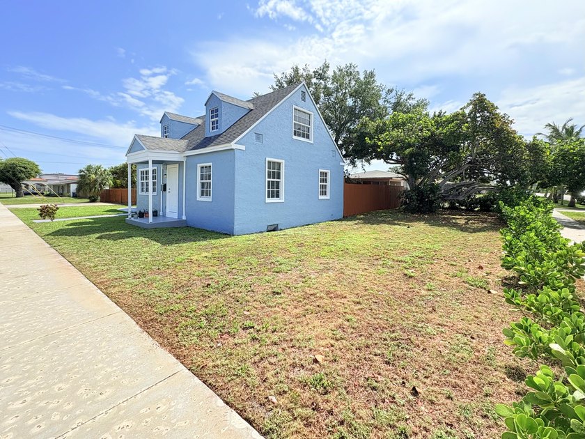 Completely remodeled inside and out-move-in ready! This - photo 2