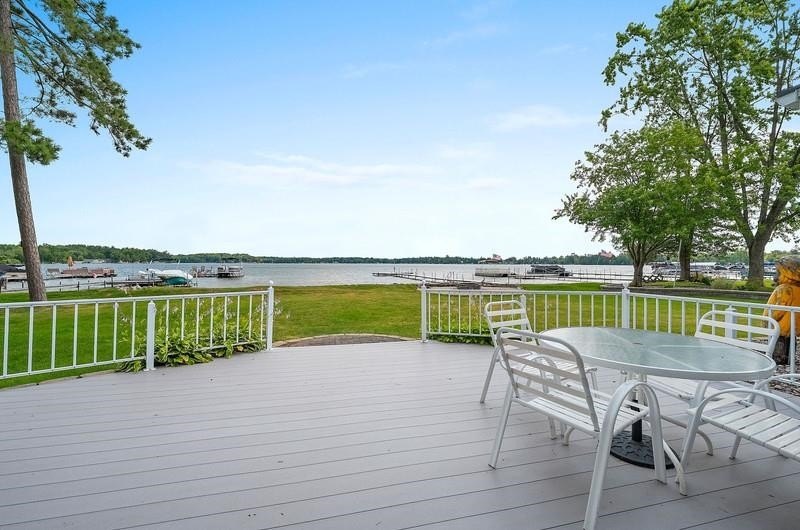 Beautiful arched-window entry welcomes you to this inviting lake - photo 47