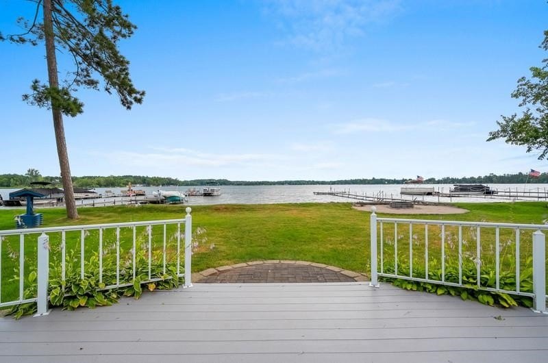 Beautiful arched-window entry welcomes you to this inviting lake - photo 49