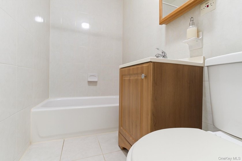 Exceptional brownstone six-unit multi-family building offering a - photo 12