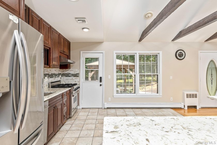 Beautifully updated Hi-Ranch on 1.5 private, park-like acres - photo 16