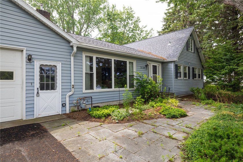 Nestled on 2.11 acres in the Town of Canandaigua, this spacious - photo 4