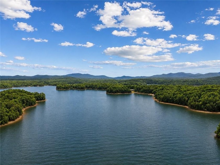 Exceptional 4.81-acre partially cleared lot in the gated - photo 2