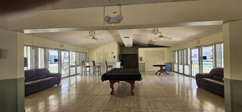55+ Community .Wonderful View of Pool Area. Lg 2/2 remodeled - photo 25