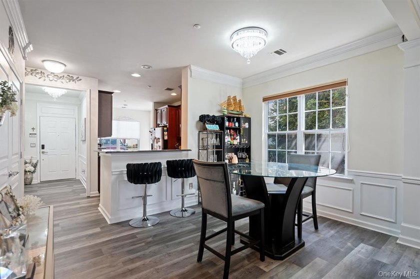 Welcome to this highly sought-after first-floor end unit located - photo 10