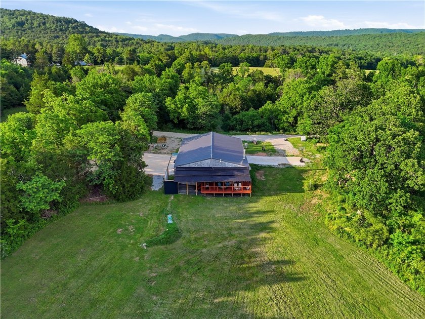 Secluded on 32.36 acres along the Kings River, this - photo 24