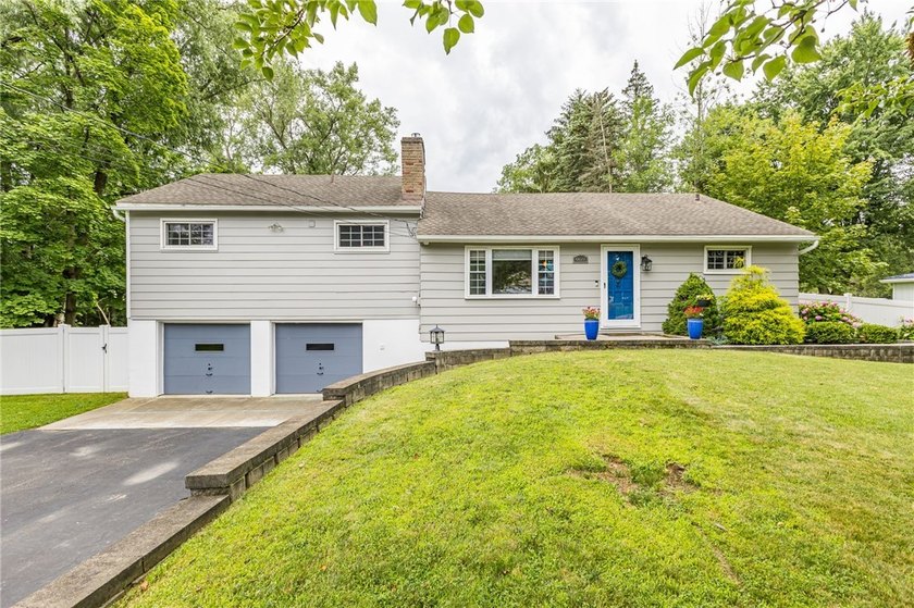 Exceptional and move-in ready split-level gem in the highly - photo 3