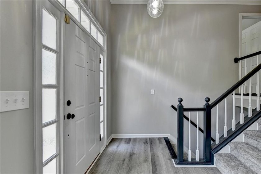 Welcome to this beautifully updated 5-bedroom, 3-bathroom home - photo 3