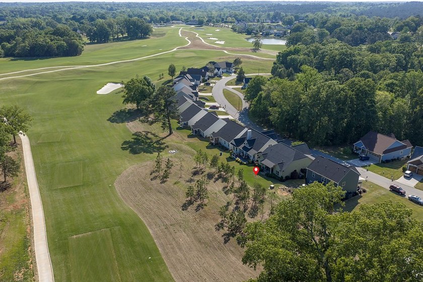Experience golf course living at its finest on Hole 15 of the - photo 16