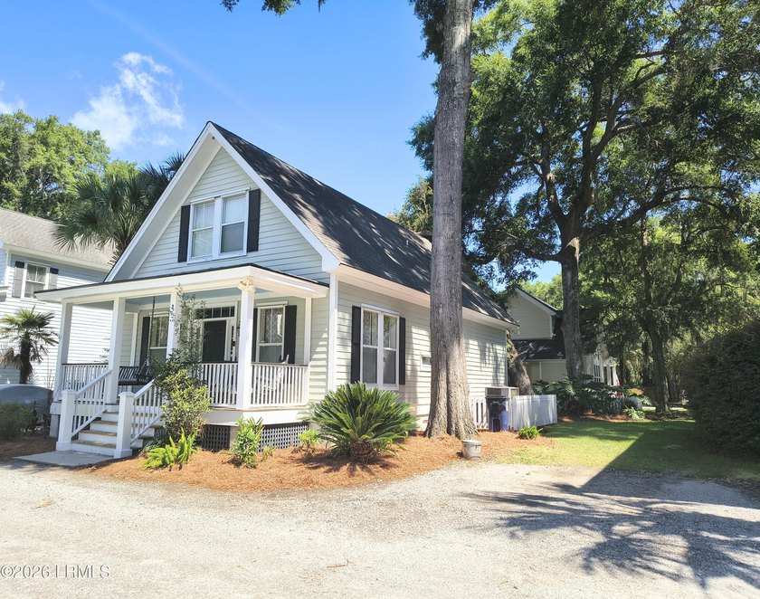 This beautifully designed home offers the ease of - photo 3