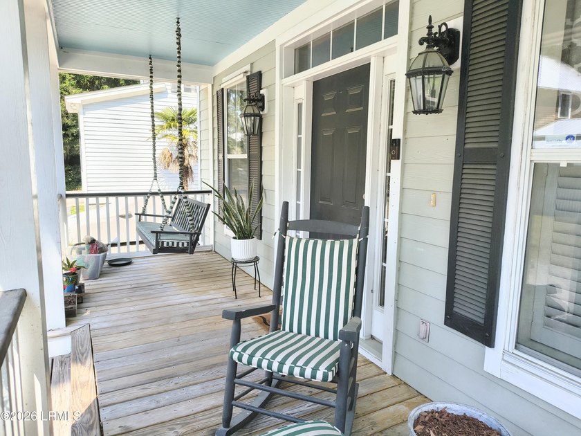 This beautifully designed home offers the ease of - photo 4