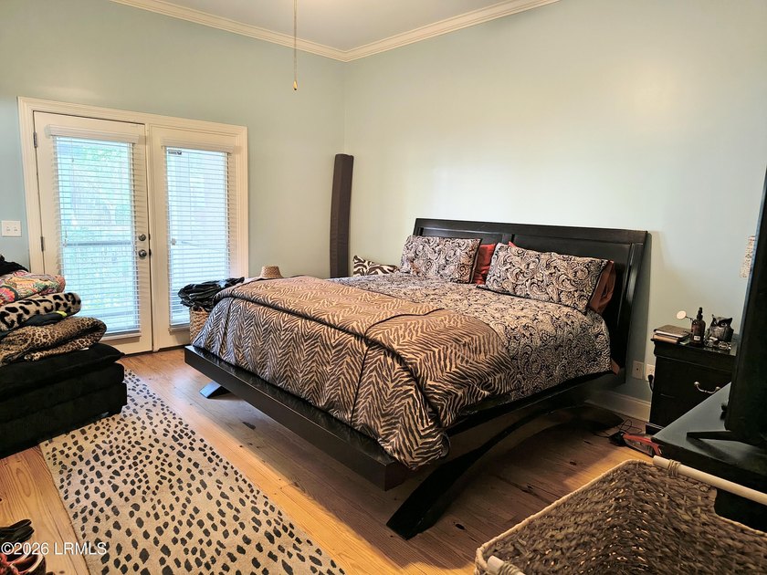 This beautifully designed home offers the ease of - photo 8