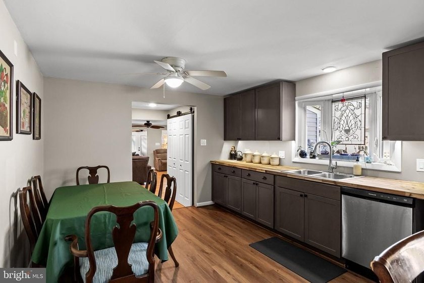 Welcome to this spacious 5-bedroom, 2.5-bath home nestled in the - photo 20