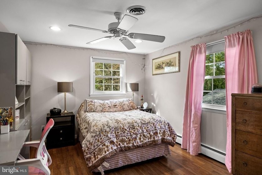 Welcome to this spacious 5-bedroom, 2.5-bath home nestled in the - photo 28