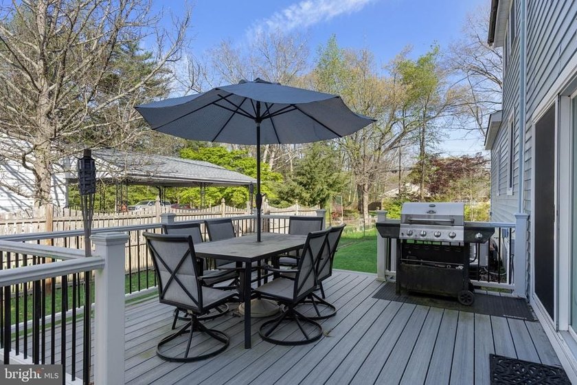 Welcome to this spacious 5-bedroom, 2.5-bath home nestled in the - photo 32