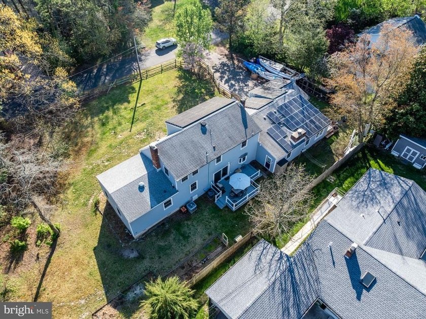 Welcome to this spacious 5-bedroom, 2.5-bath home nestled in the - photo 36