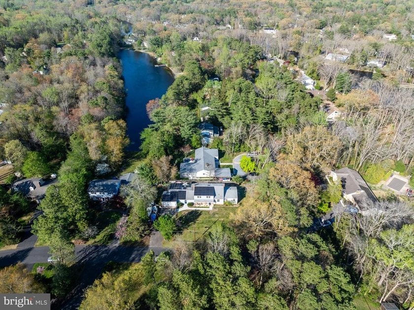 Welcome to this spacious 5-bedroom, 2.5-bath home nestled in the - photo 37