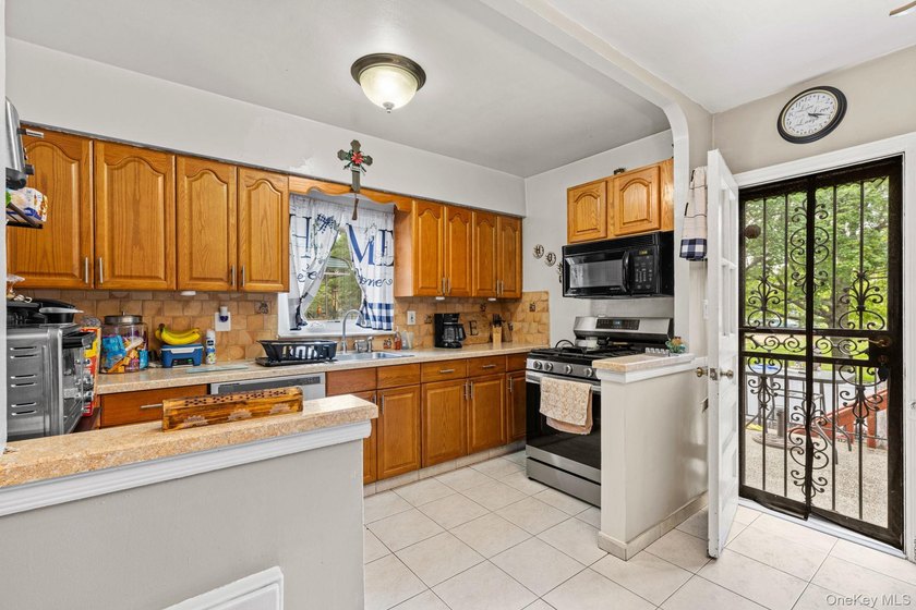 Welcome to 2027 Mayflower Avenue, a classic brick single family - photo 6